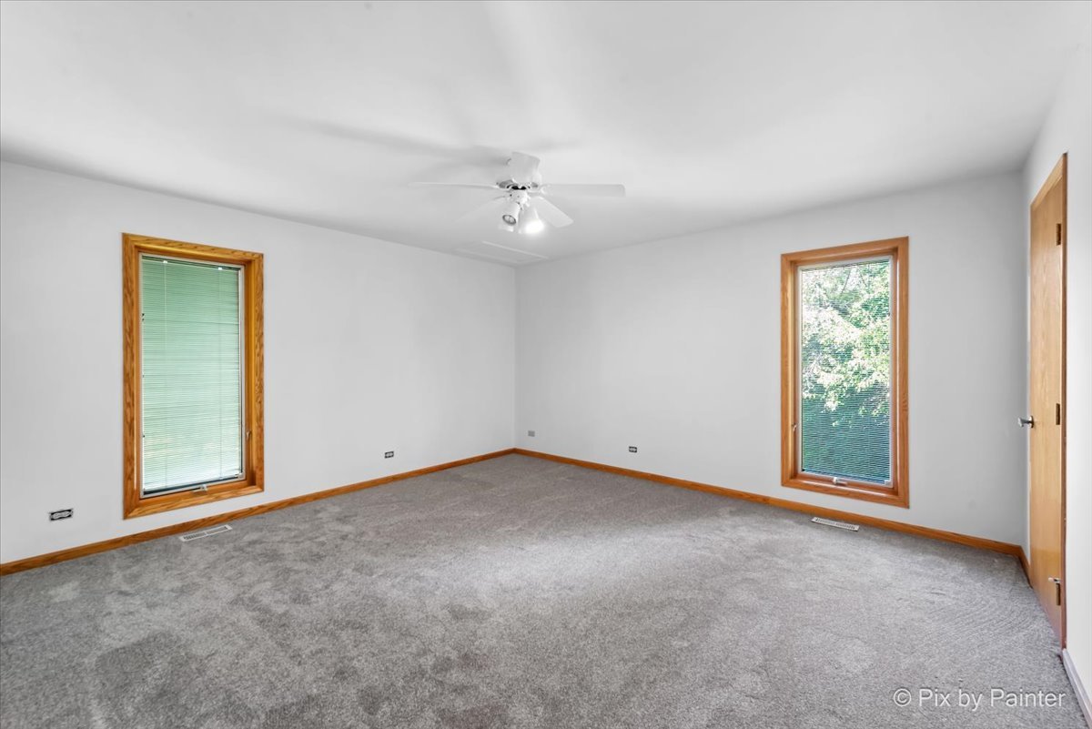322 West Dowell Road McHenry, IL 60051 - Photo 14 of 40 a view of an empty room with a window