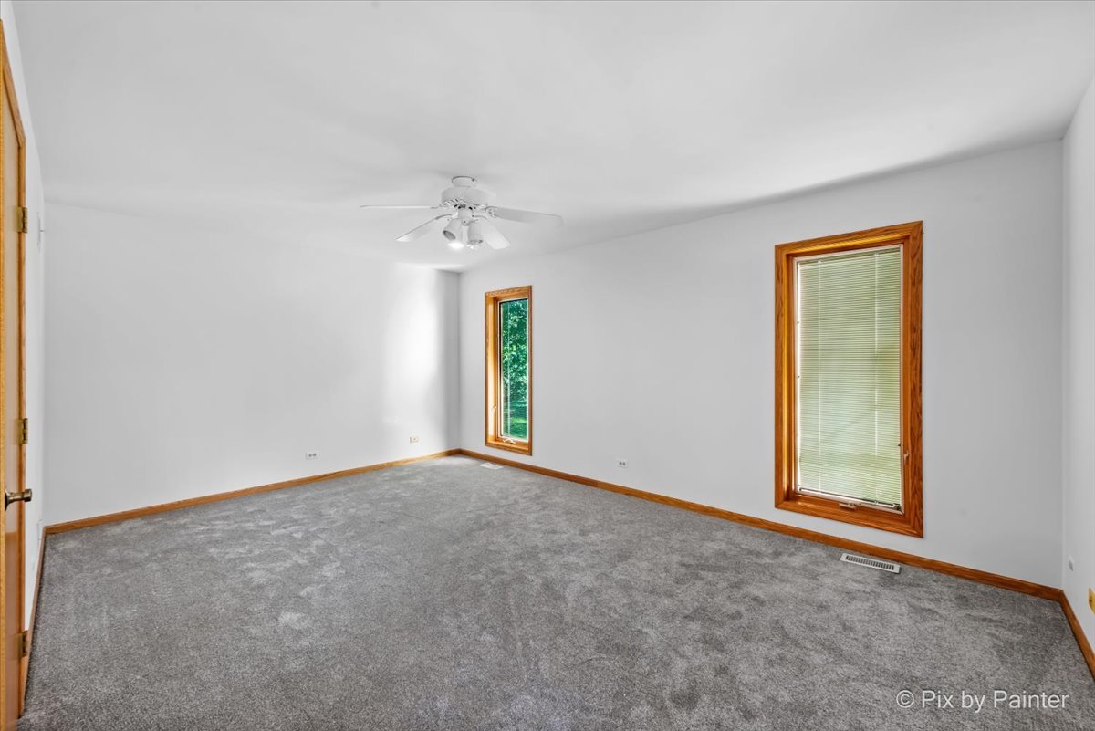 322 West Dowell Road McHenry, IL 60051 - Photo 16 of 40 an empty room with a window