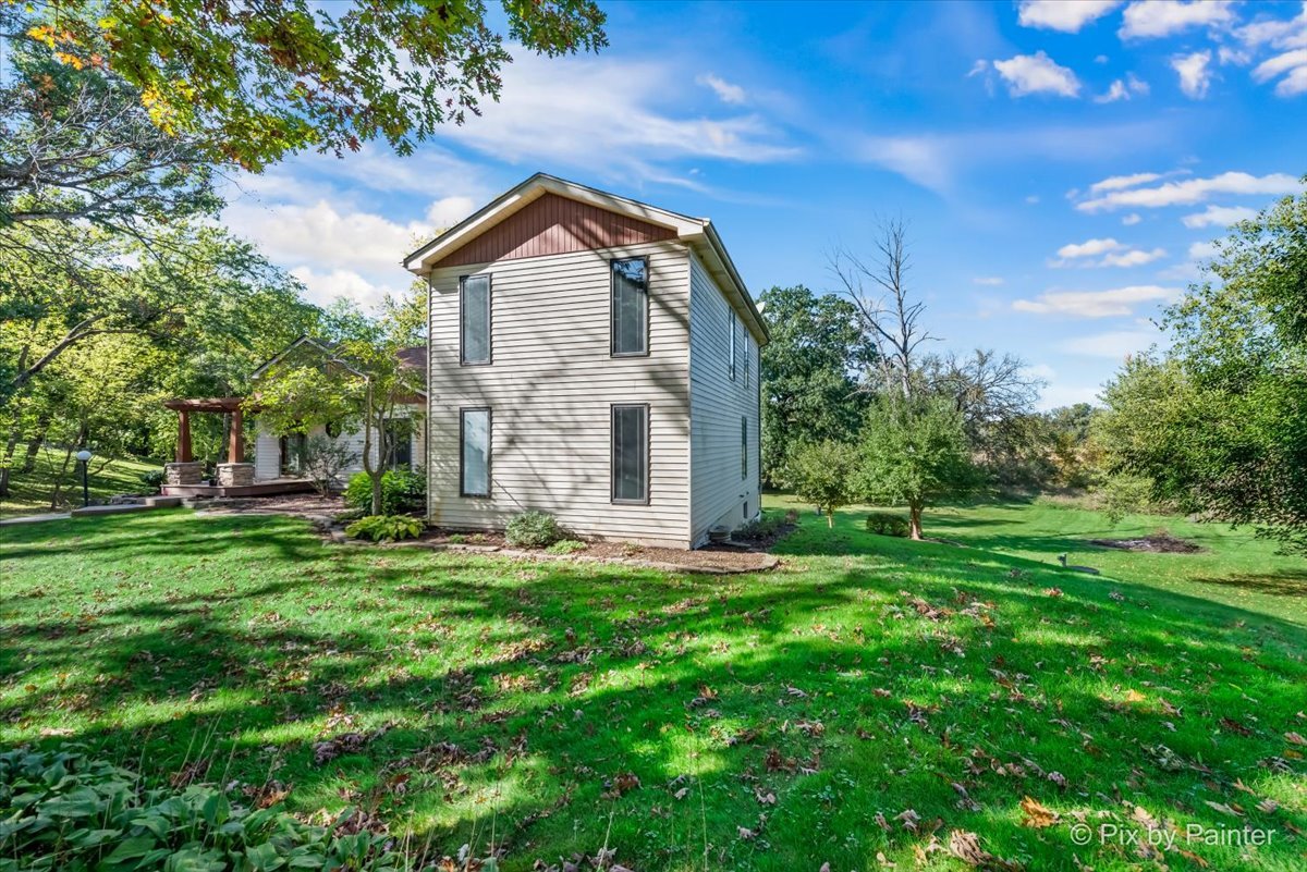 322 West Dowell Road McHenry, IL 60051 - Photo 32 of 40 a front view of a house with a yard