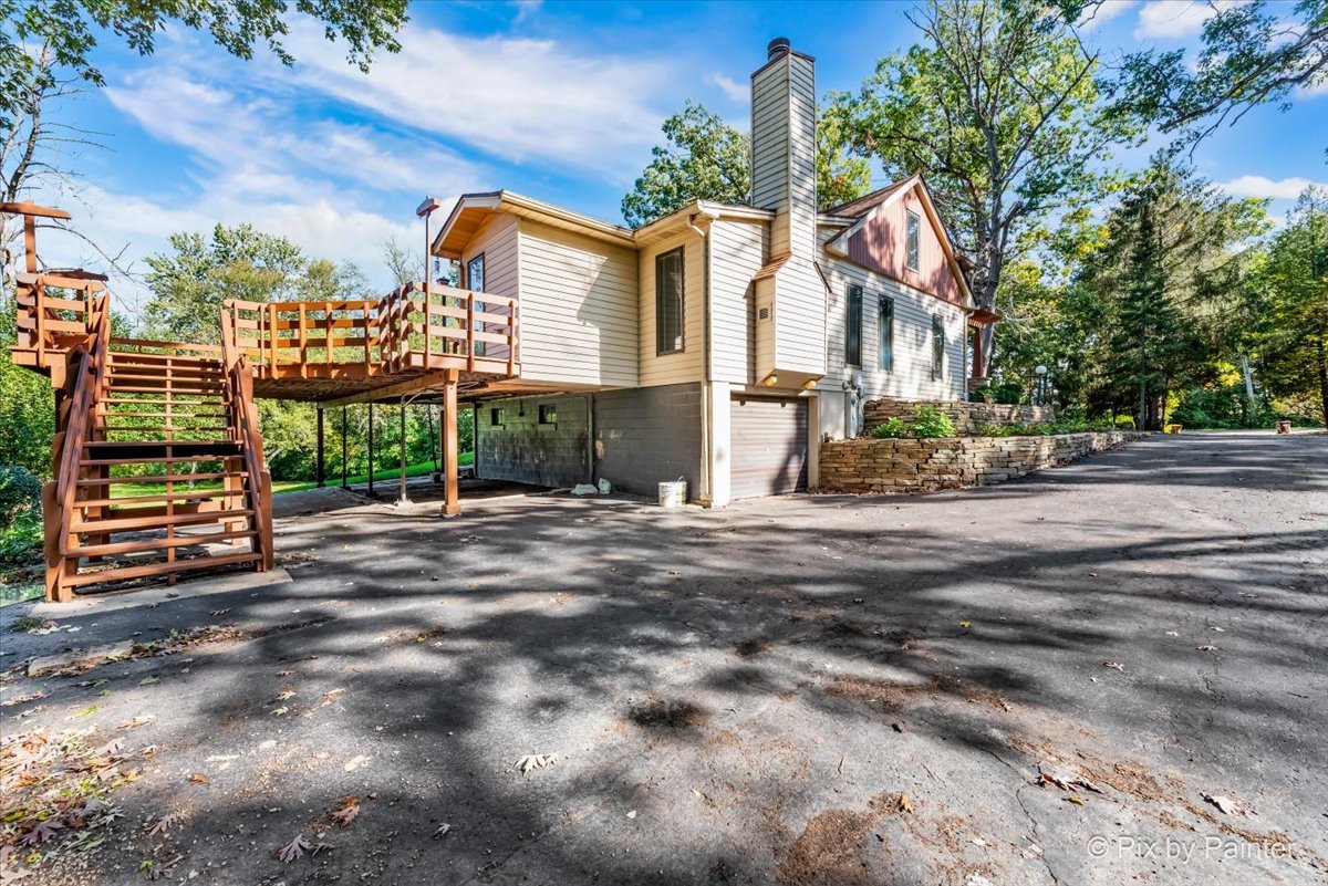 322 West Dowell Road McHenry, IL 60051 - Photo 37 of 40 a view of a street with a building in the background