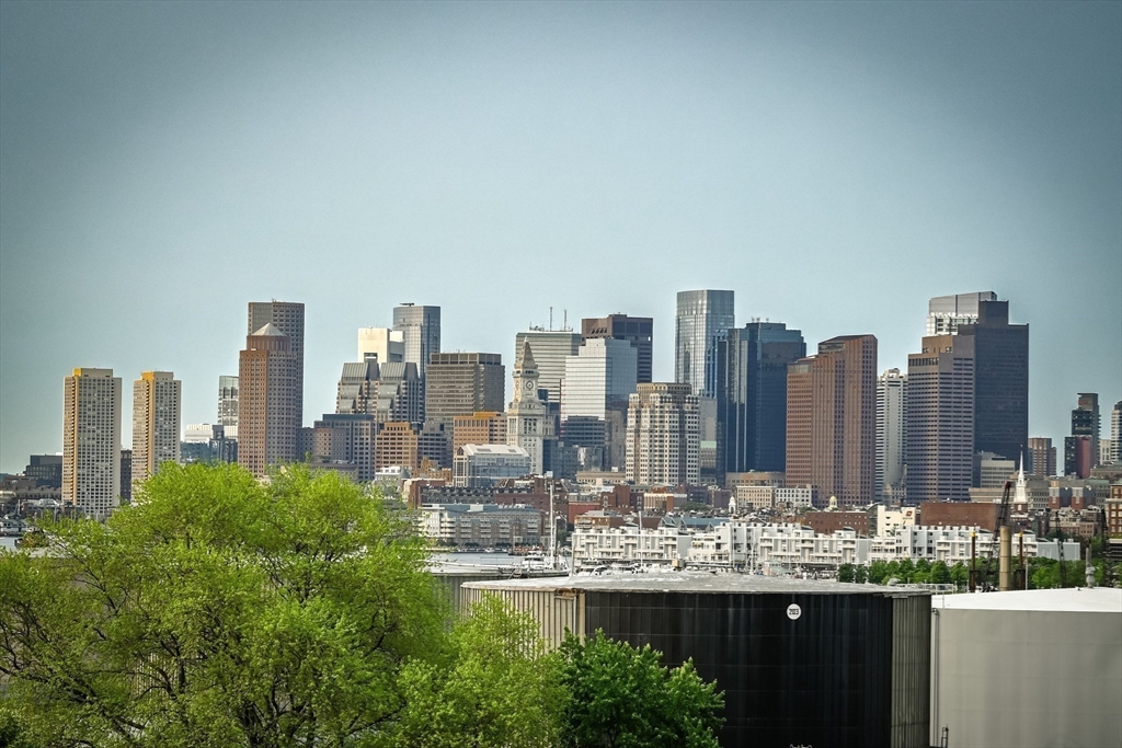23 Chestnut Street, Unit 5 Chelsea, MA 02150 - Photo 14 of 17 a view of a city with tall buildings