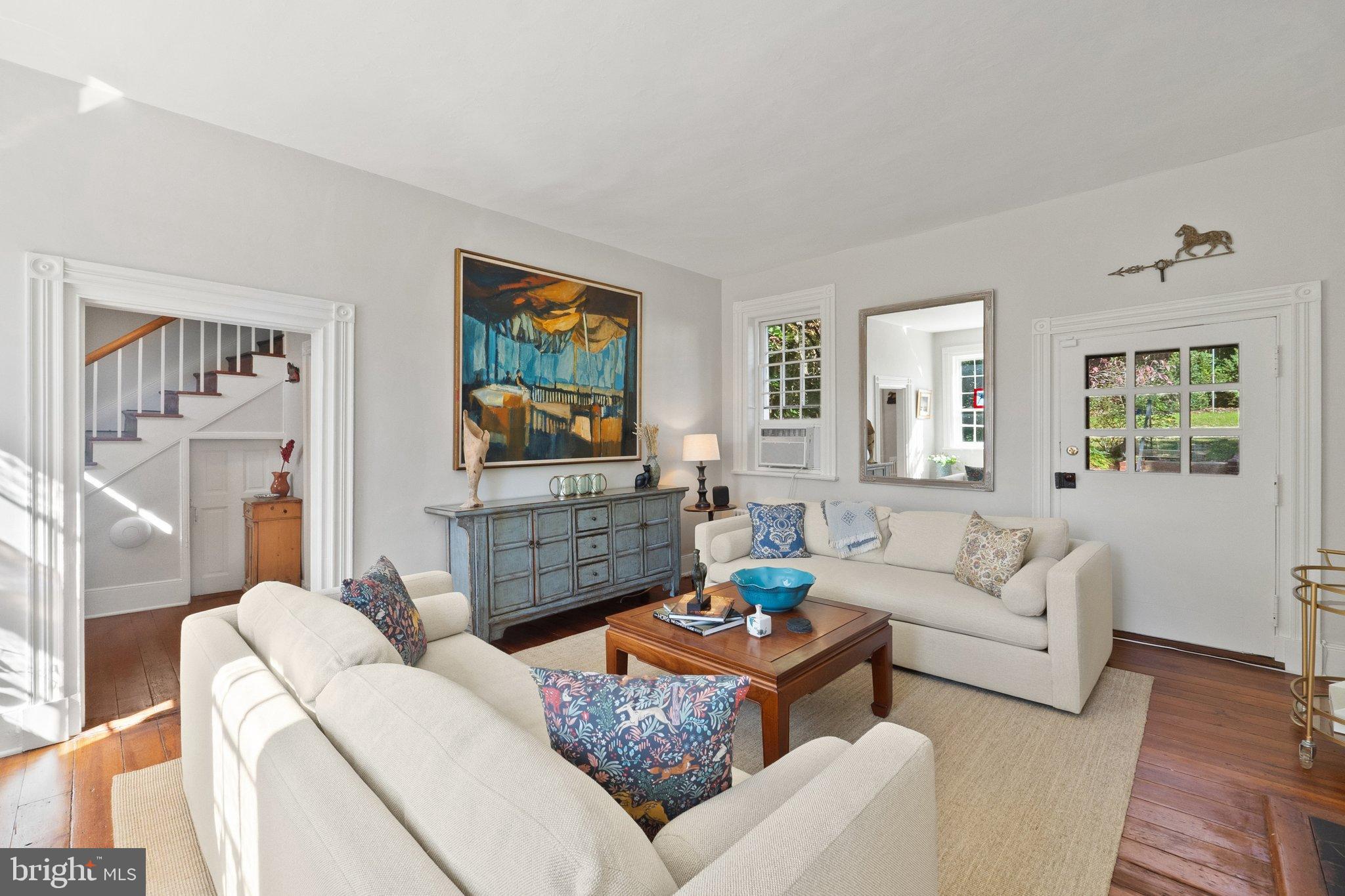 677 Federal Street Paris, VA 20130 - Photo 14 of 82 a living room with furniture a flat screen tv and a fireplace