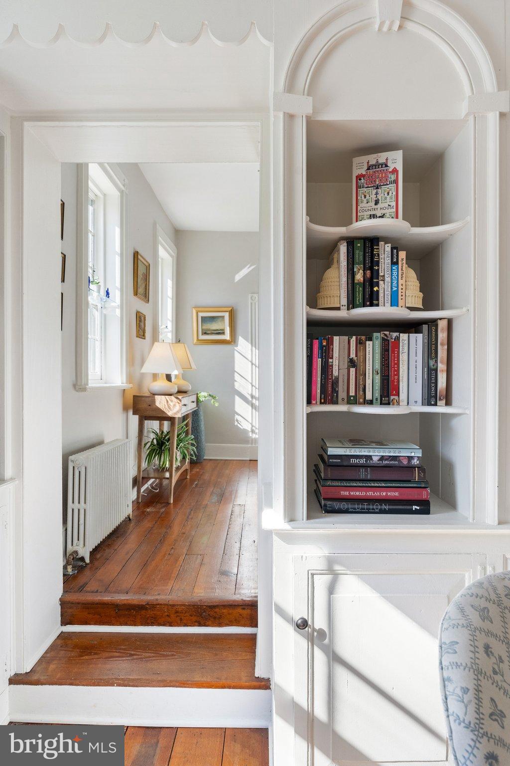 677 Federal Street Paris, VA 20130 - Photo 17 of 82 a living room with lots of furniture and a book shelf