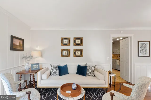 a kitchen with stainless steel appliances a refrigerator a stove a sink and a refrigerator