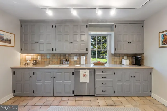a bathroom with a bathtub and a sink