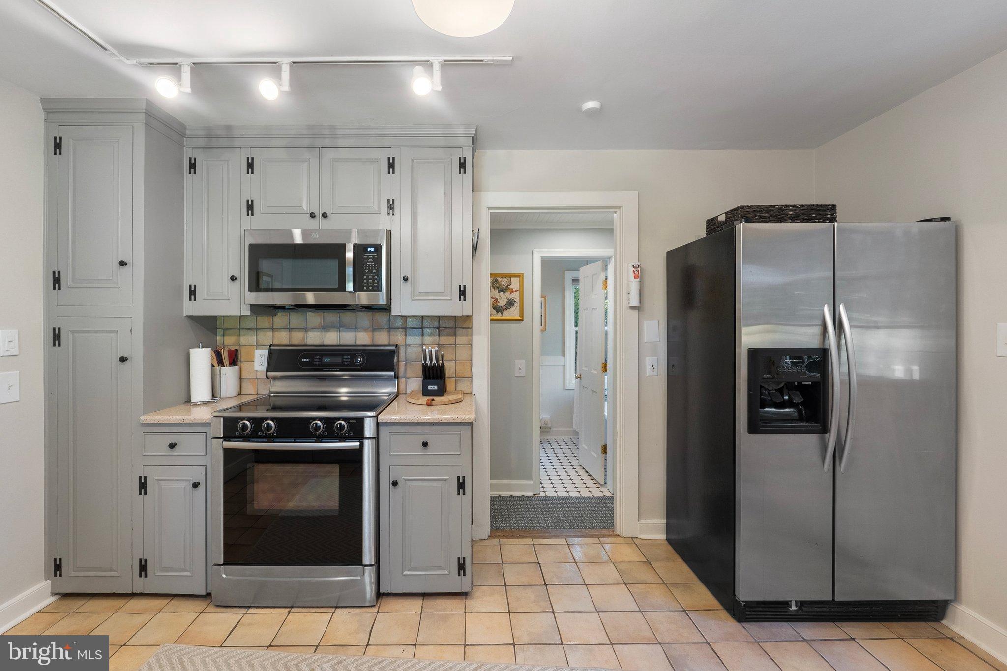 677 Federal Street Paris, VA 20130 - Photo 30 of 82 a kitchen with stainless steel appliances a refrigerator a stove a sink and a refrigerator