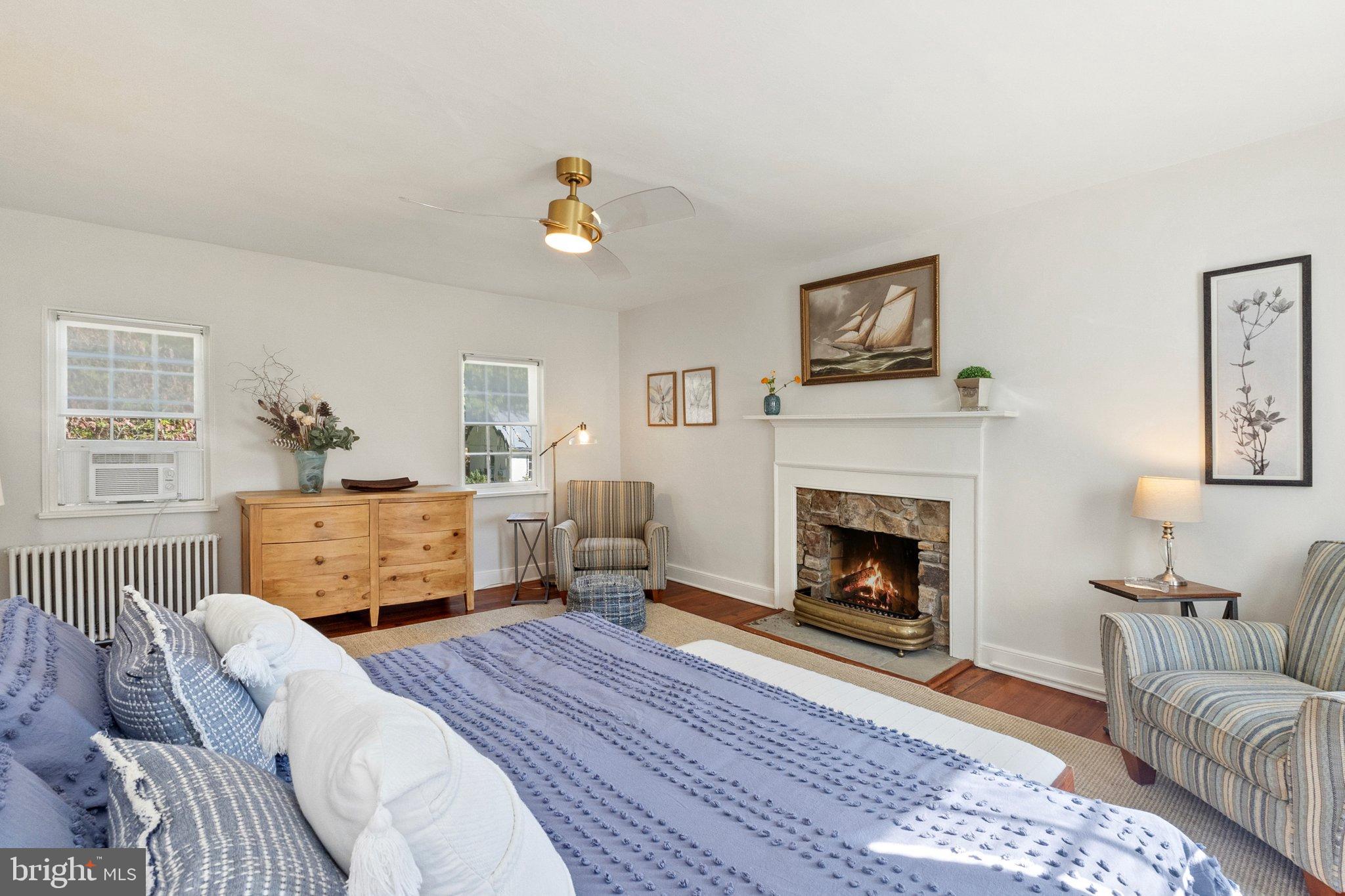 677 Federal Street Paris, VA 20130 - Photo 41 of 82 a bedroom with furniture and a fireplace