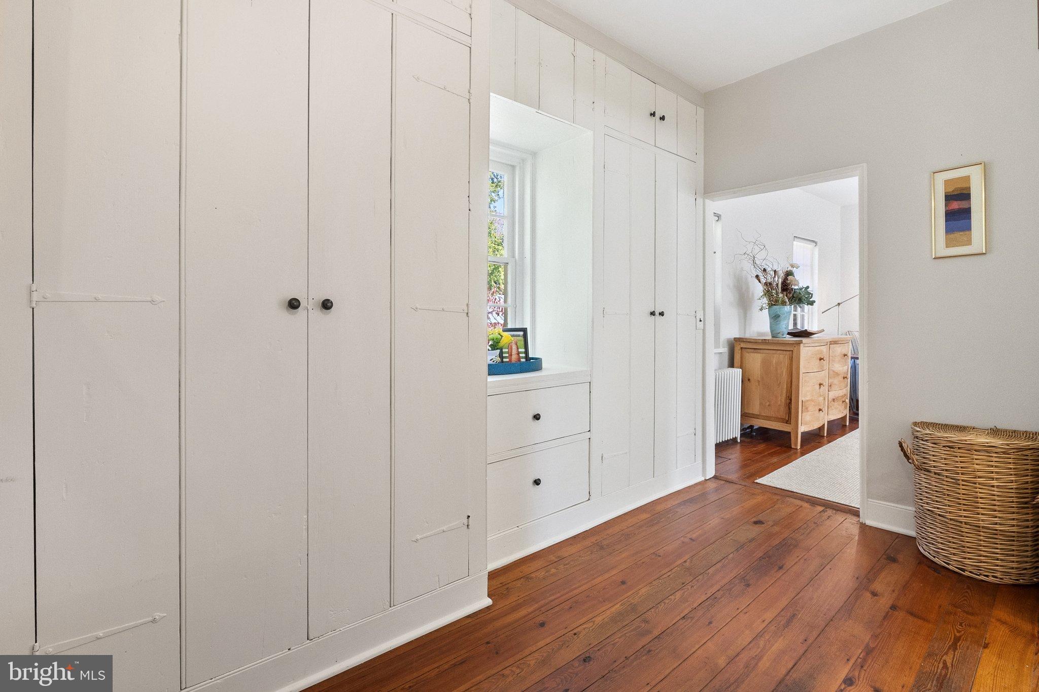 677 Federal Street Paris, VA 20130 - Photo 45 of 82 a view of a hallway with wooden floor and closet