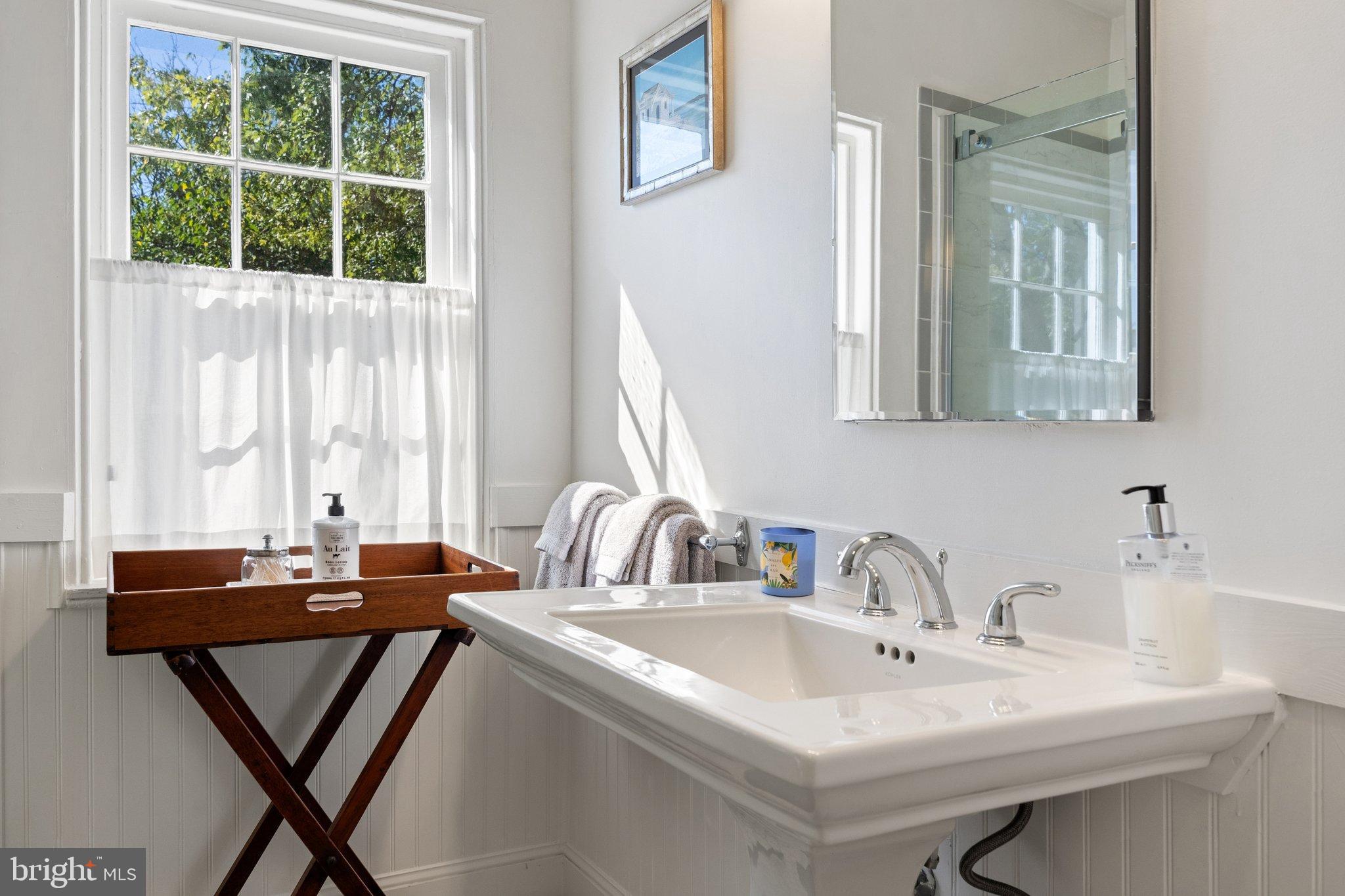 677 Federal Street Paris, VA 20130 - Photo 48 of 82 a bathroom with a sink and a mirror