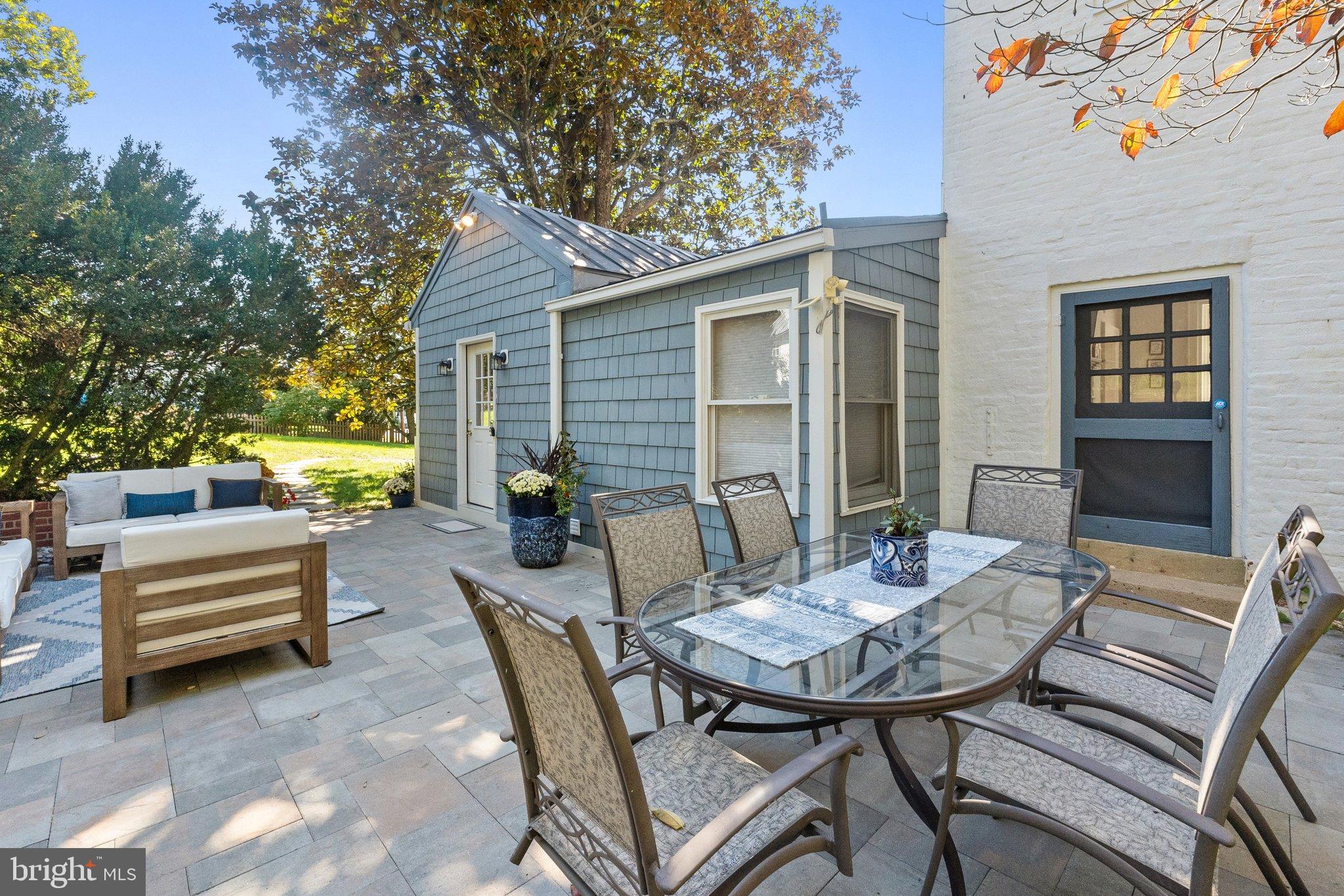 677 Federal Street Paris, VA 20130 - Photo 50 of 82 a view of a patio with a dining table and chairs