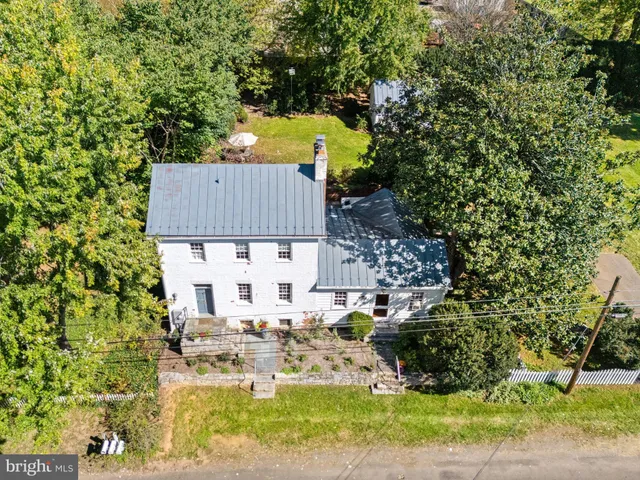 a view of a livingroom with furniture and a wooden floor
