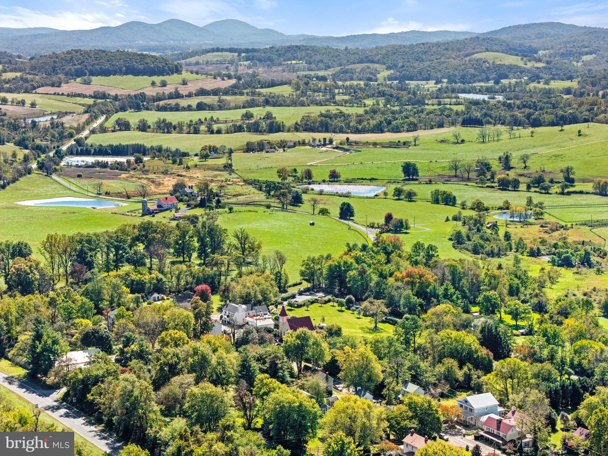 677 Federal Street Paris, VA 20130 - Photo 67 of 82 a view of a city with a lush green hillside