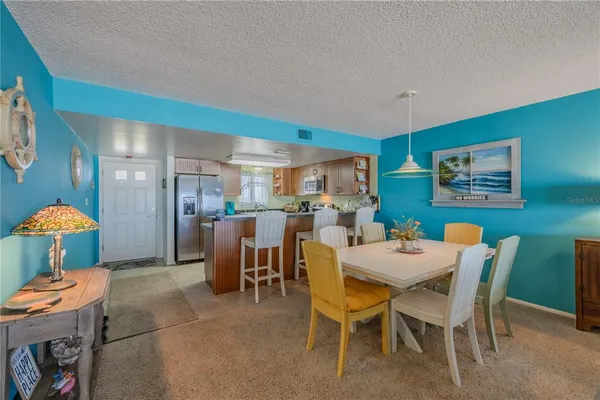 a view of a dining room with furniture