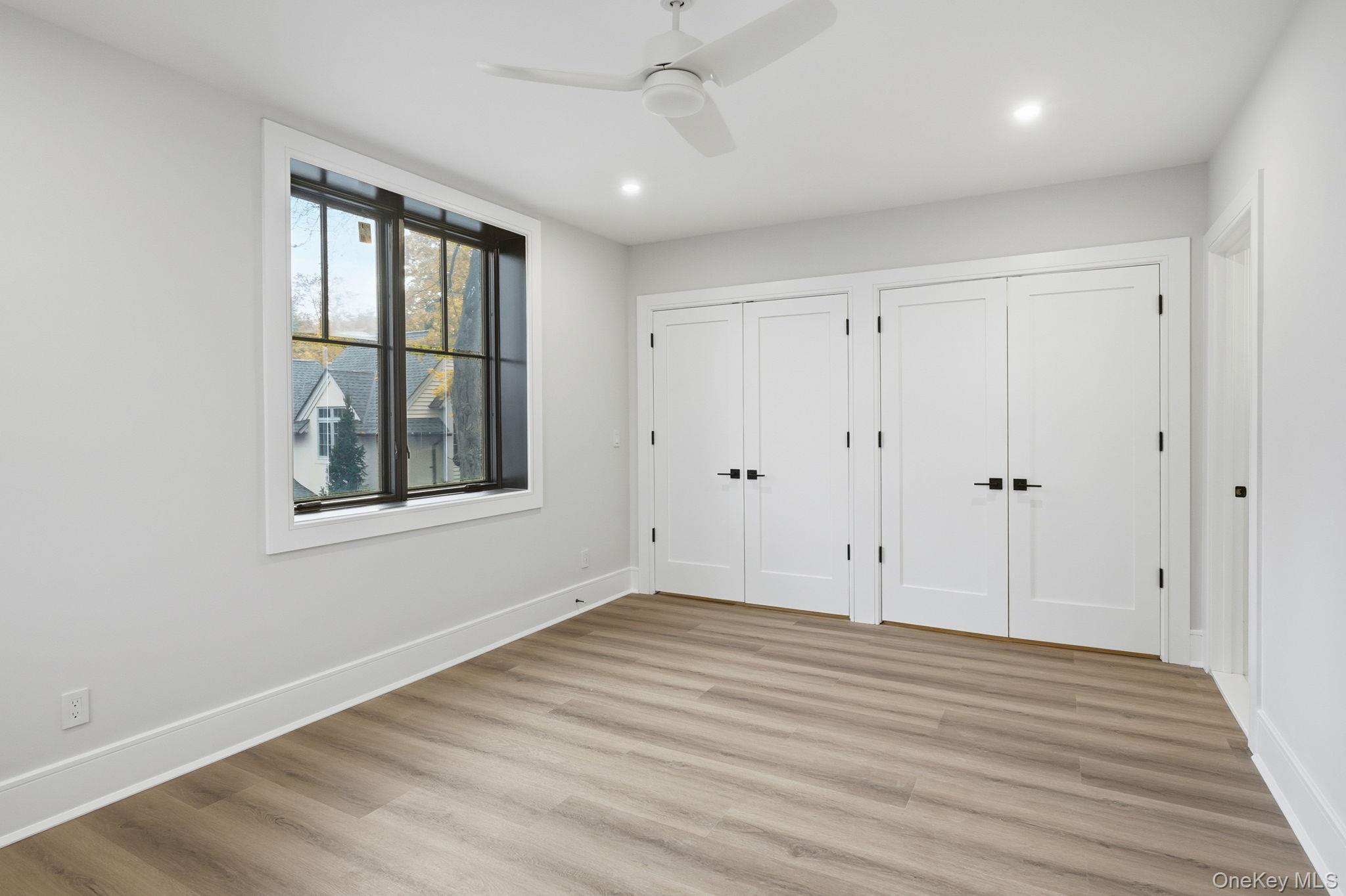 34 Clinton Avenue, Unit 2 Dobbs Ferry, NY 10522 - Photo 10 of 12 wooden floor in an empty room with a window