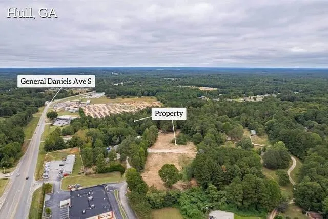 an aerial view of residential house with outdoor space
