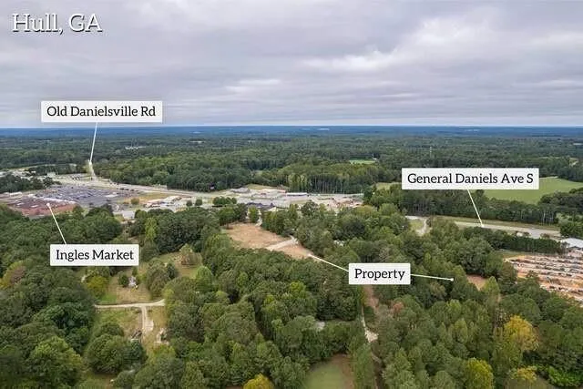 a view of a sign board and yard