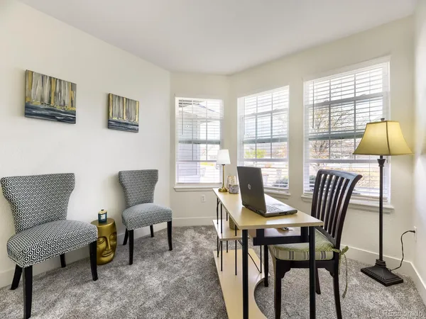a view of a livingroom with furniture and a couch