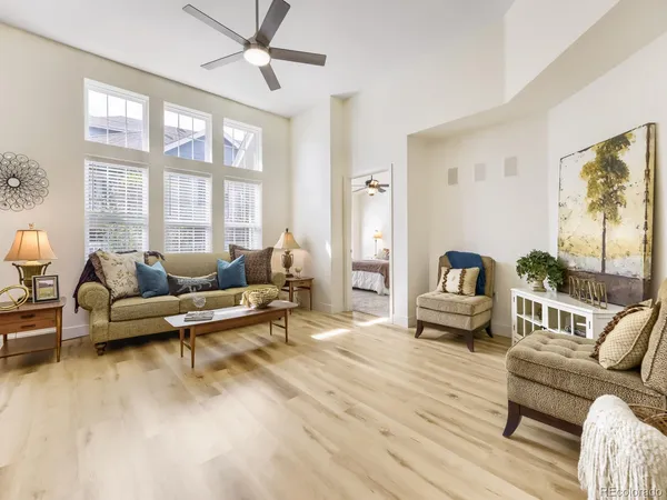 a living room with furniture and a table