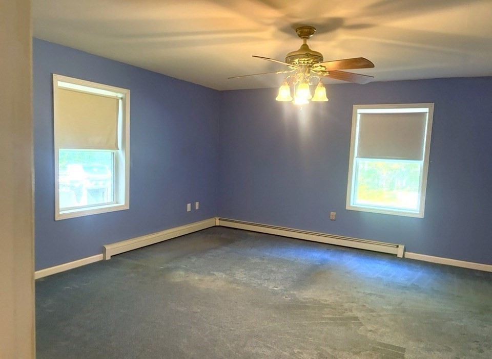 88 Colby Drive Halifax, MA 02338 - Photo 11 of 38 an empty room with a window