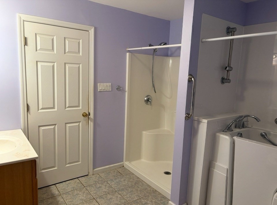 88 Colby Drive Halifax, MA 02338 - Photo 13 of 38 a bathroom with a shower and a sink