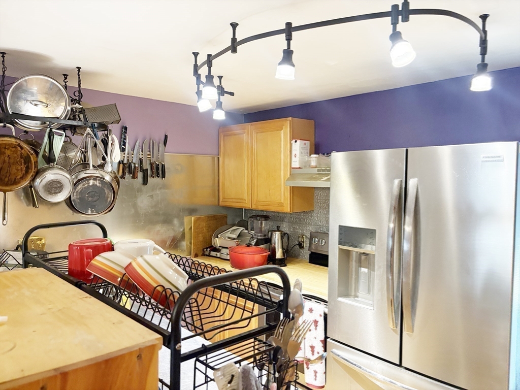 88 Colby Drive Halifax, MA 02338 - Photo 20 of 38 a kitchen with a refrigerator and a stove
