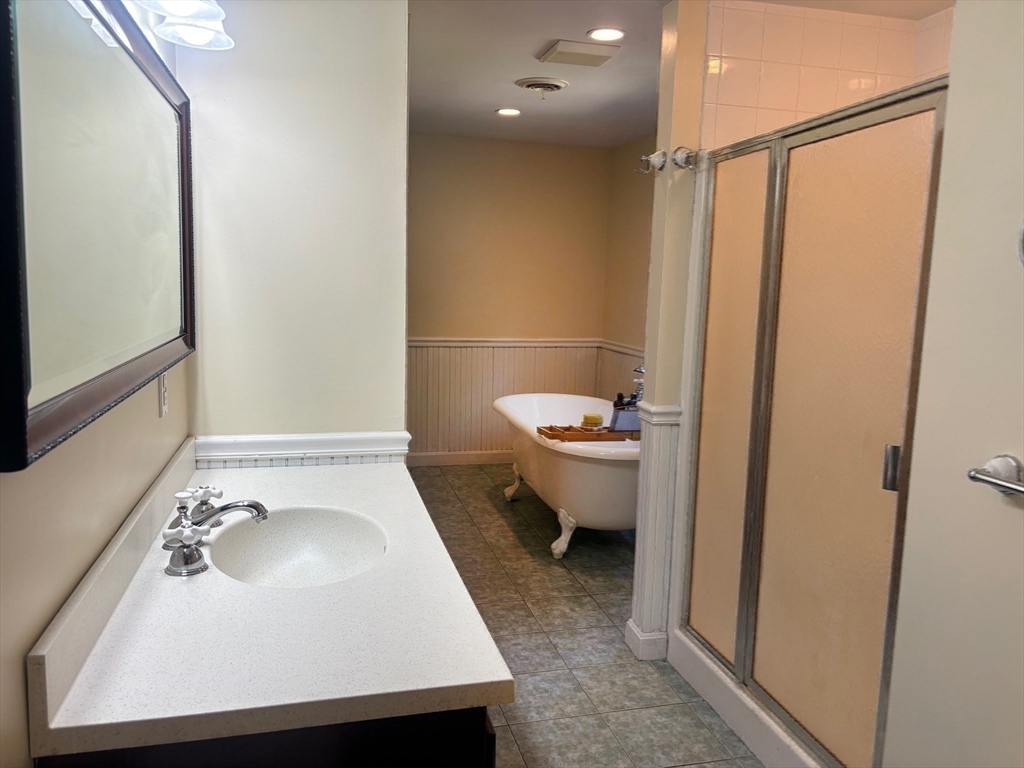 88 Colby Drive Halifax, MA 02338 - Photo 30 of 38 a bathroom with a sink toilet and shower