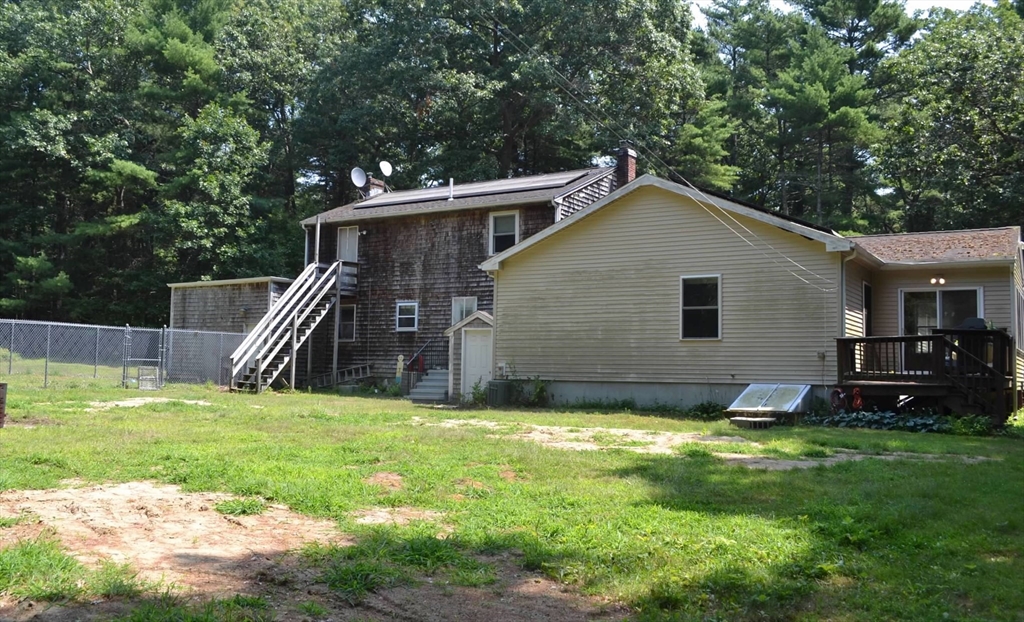 88 Colby Drive Halifax, MA 02338 - Photo 36 of 38 a view of a house with a yard