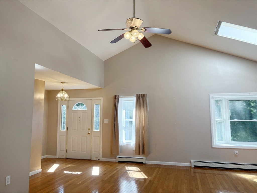 88 Colby Drive Halifax, MA 02338 - Photo 4 of 38 a view of livingroom with furniture and chandelier fan