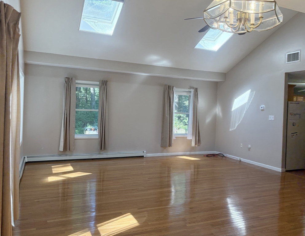 88 Colby Drive Halifax, MA 02338 - Photo 7 of 38 a view of empty room with window