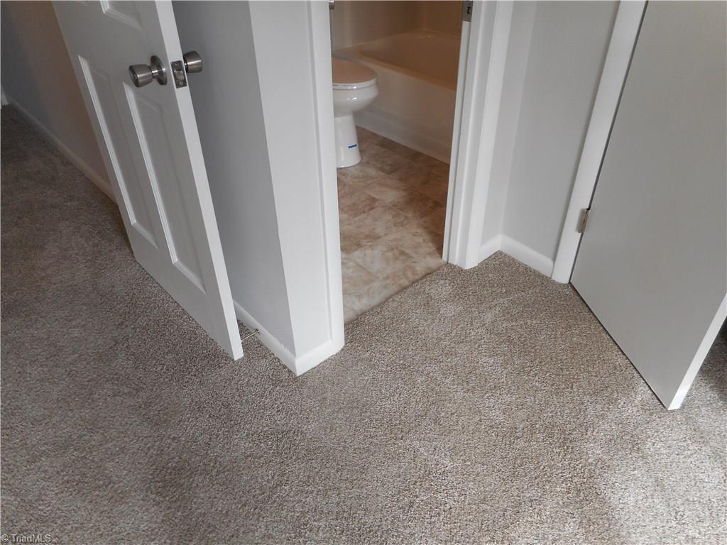5725 Bramblegate Road, Unit F Greensboro, NC 27409 - Photo 21 of 30 Bedroom Two: Here you will see that you do loose some small floor space due to the full size bathroom in bedroom two.