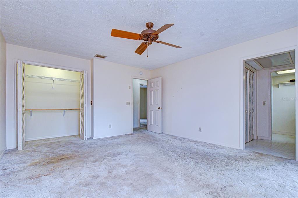 2608 Bellwood Drive Brandon, FL 33511 - Photo 14 of 27 a view of empty room with ceiling fan