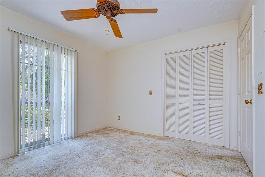 2608 Bellwood Drive Brandon, FL 33511 - Photo 18 of 27 an empty room with windows