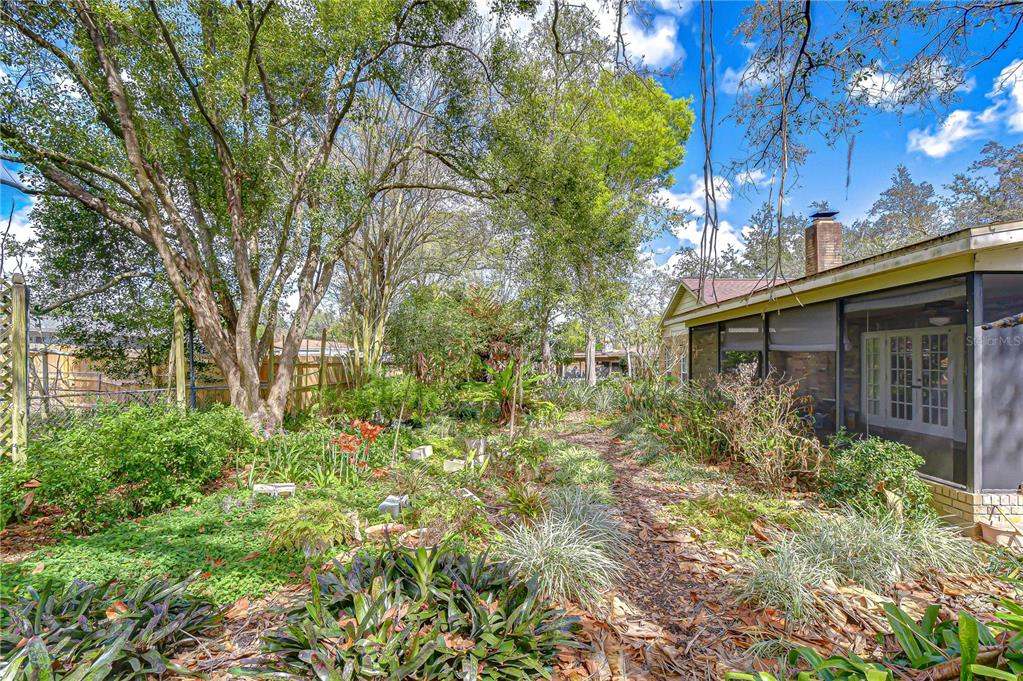2608 Bellwood Drive Brandon, FL 33511 - Photo 2 of 27 a view of a house with large trees