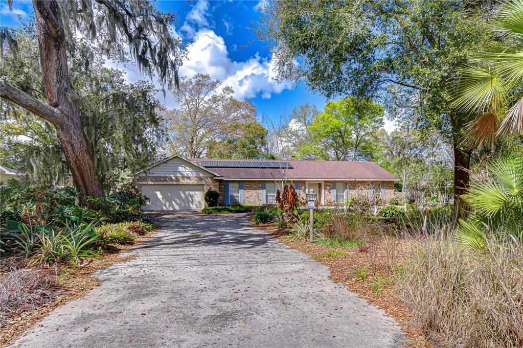 2608 Bellwood Drive Brandon, FL 33511 - Photo 27 of 27 a view of a house with a yard
