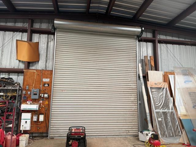 4565 Morgan Road Angels Camp, CA 95222 - Photo 3 of 43 garage featuring roll up door