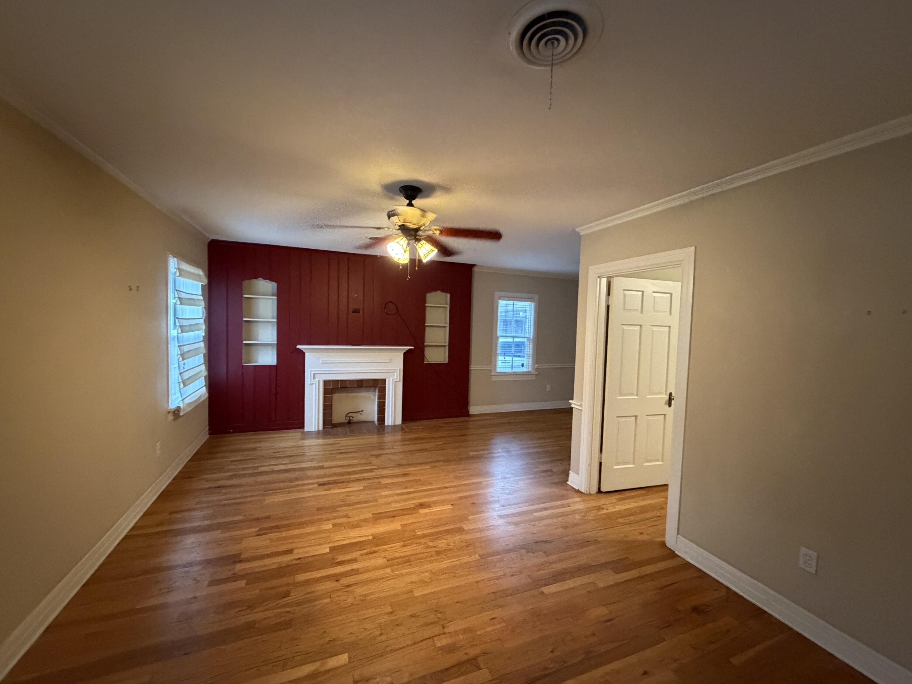 3110 22nd Street Lubbock, TX 79410 - Photo 2 of 22 a view of a livingroom with a fireplace