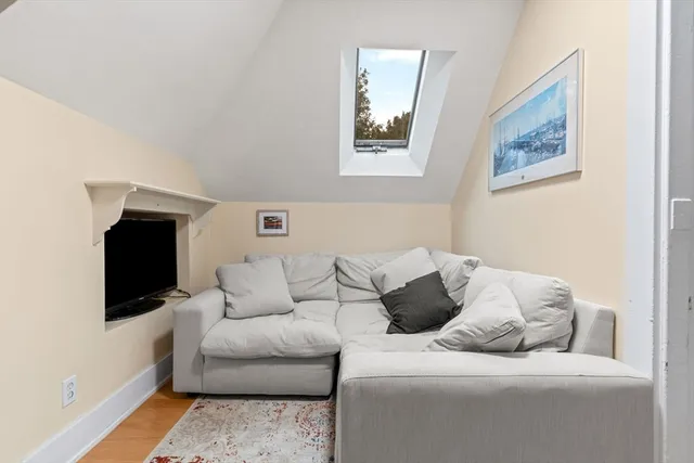 a living room with furniture and a couch