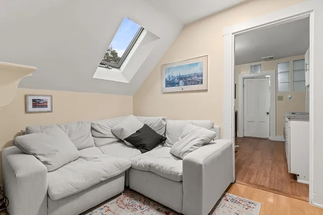 a living room with furniture and a couch