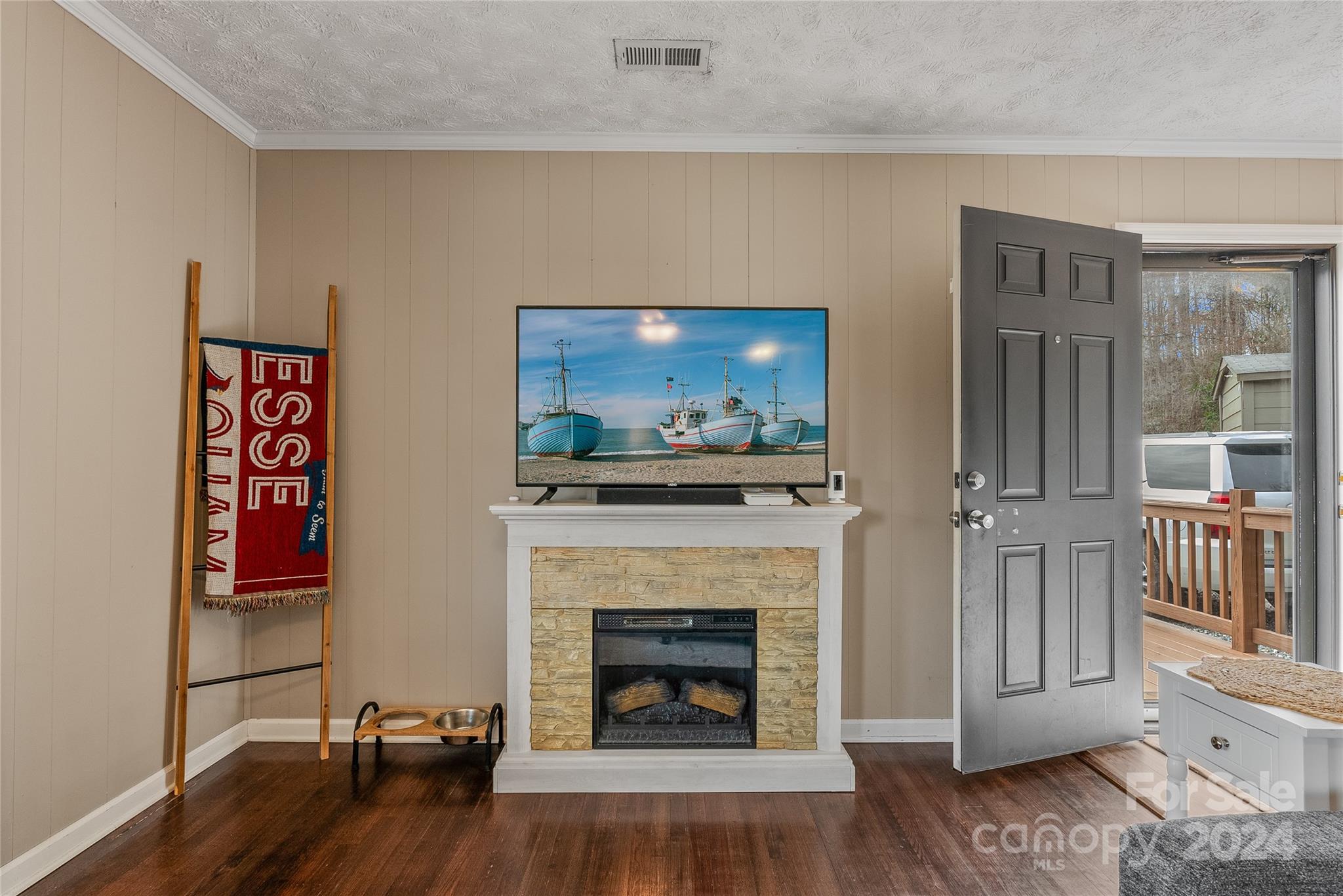 242 Maple Creek Road Rutherfordton, NC 28139 - Photo 11 of 37 a living room with furniture and a fireplace