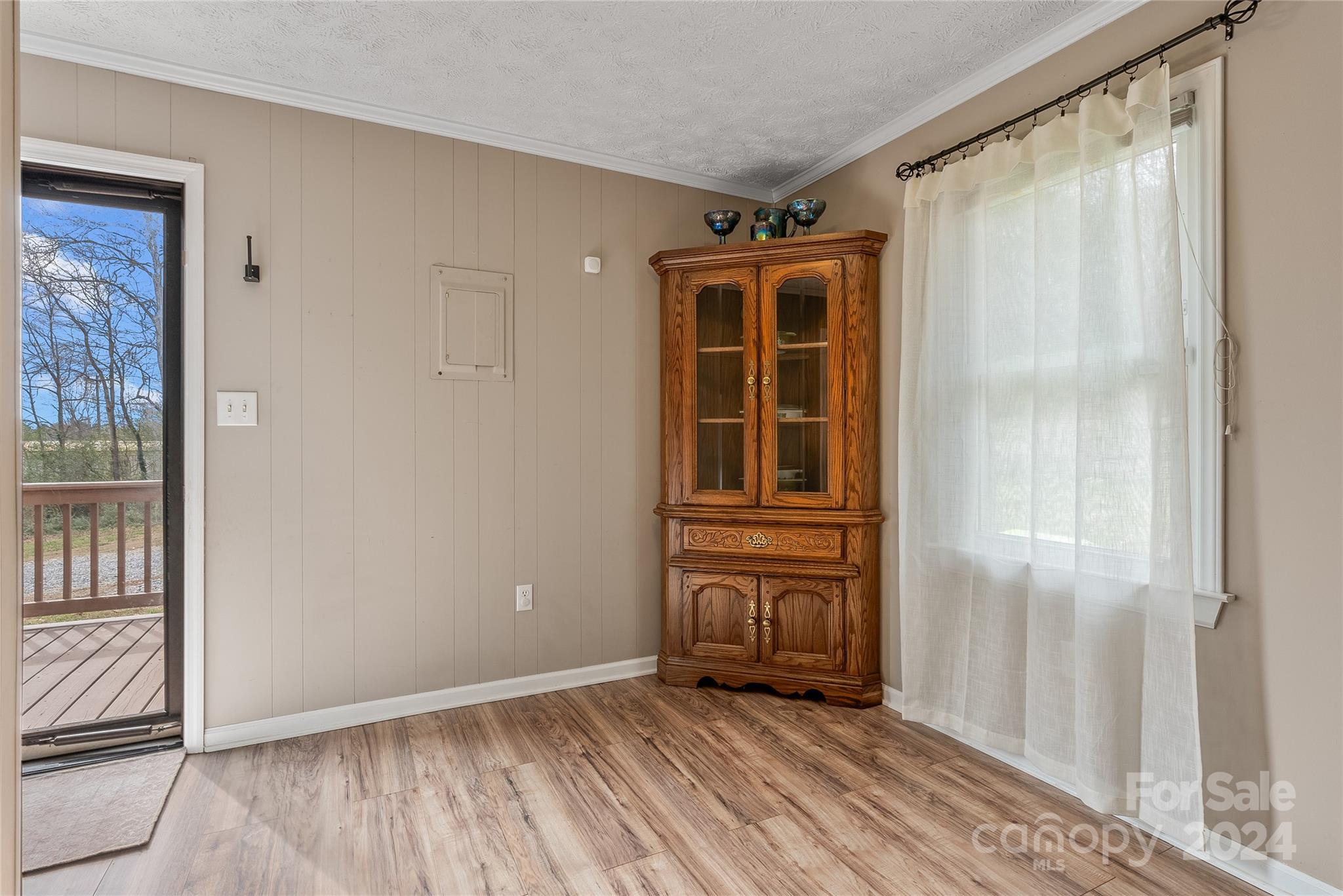 242 Maple Creek Road Rutherfordton, NC 28139 - Photo 15 of 37 an empty room with wooden floor and windows