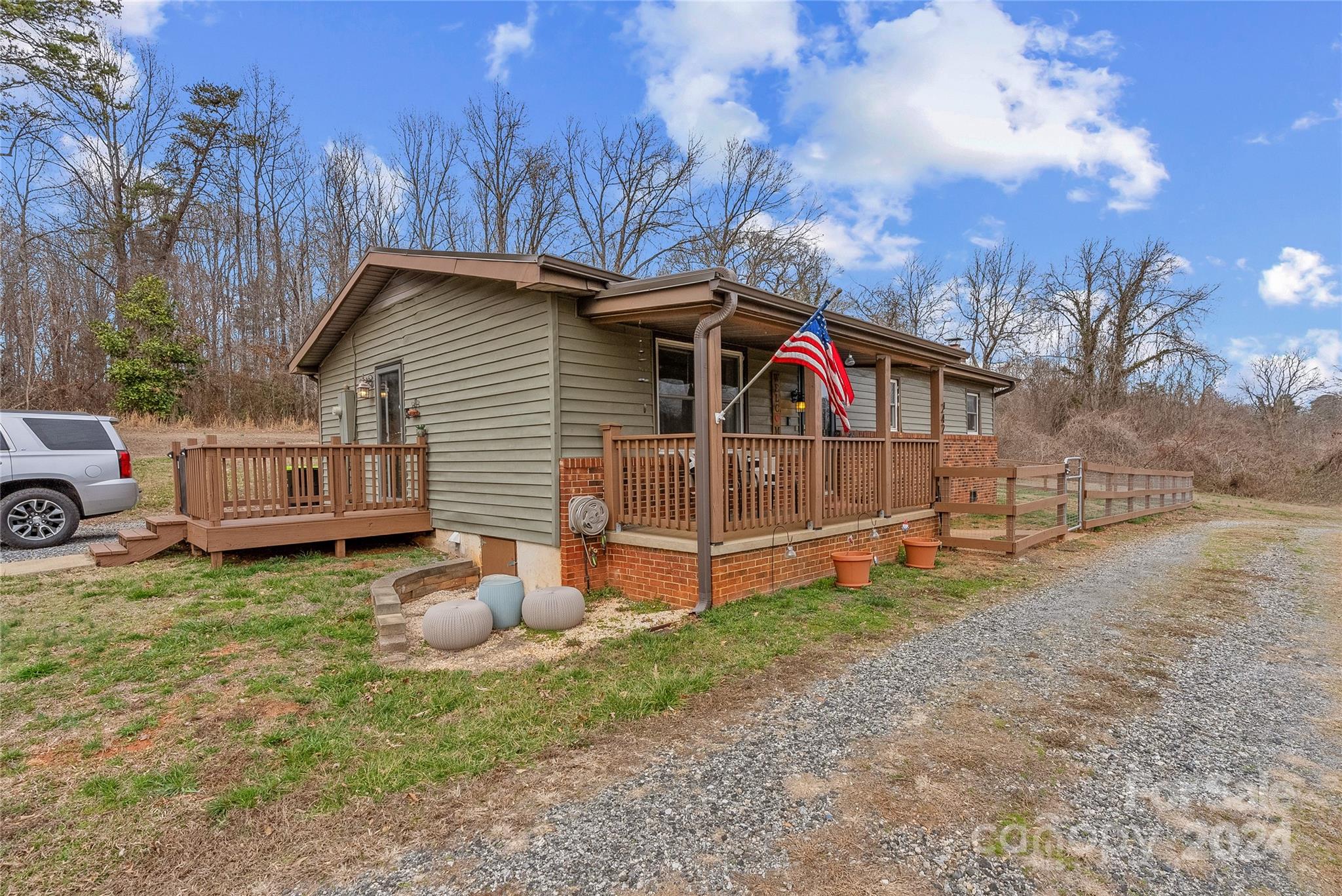 242 Maple Creek Road Rutherfordton, NC 28139 - Photo 2 of 37 a view of a house with a yard