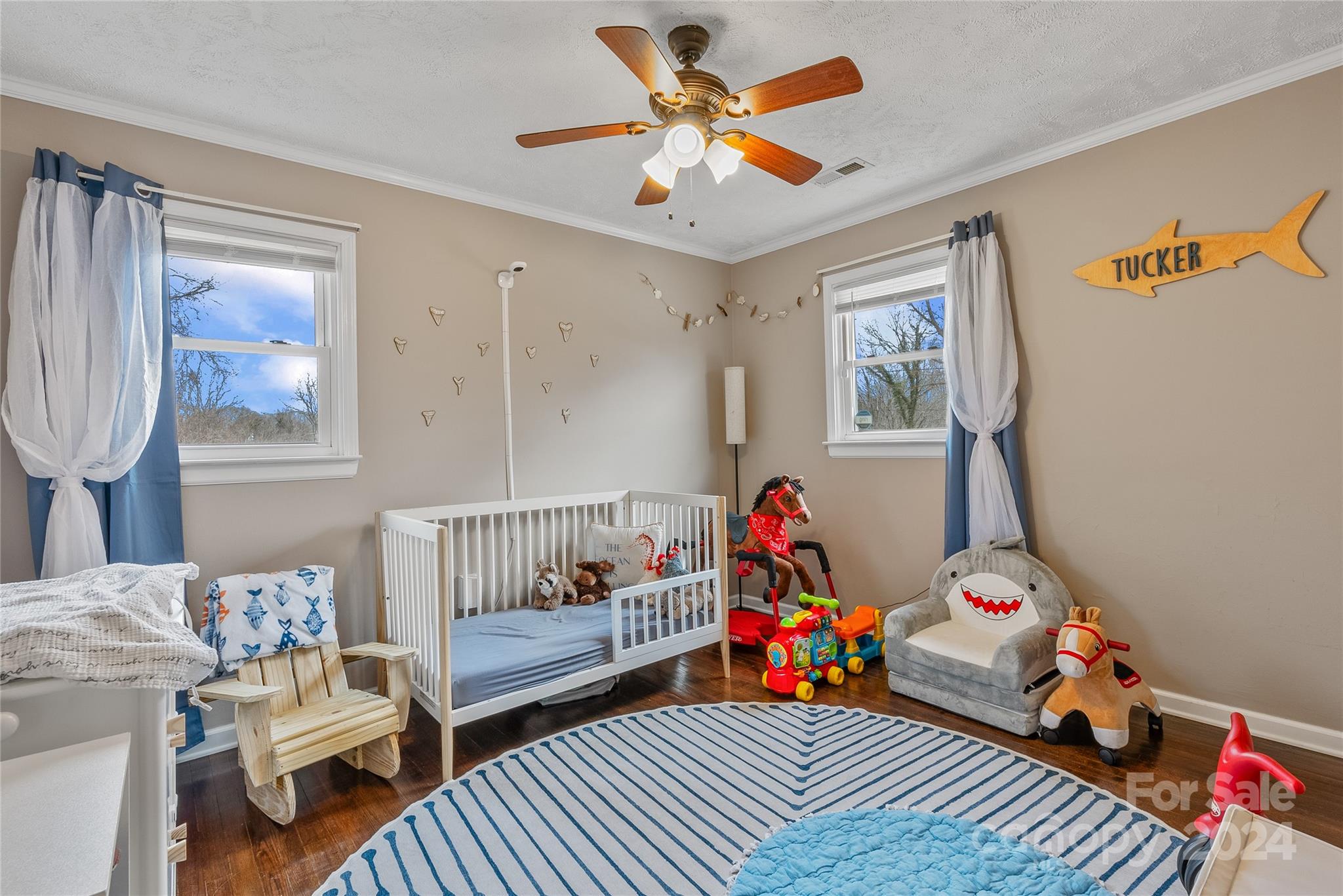 242 Maple Creek Road Rutherfordton, NC 28139 - Photo 25 of 37 a bedroom with furniture and a baby crib
