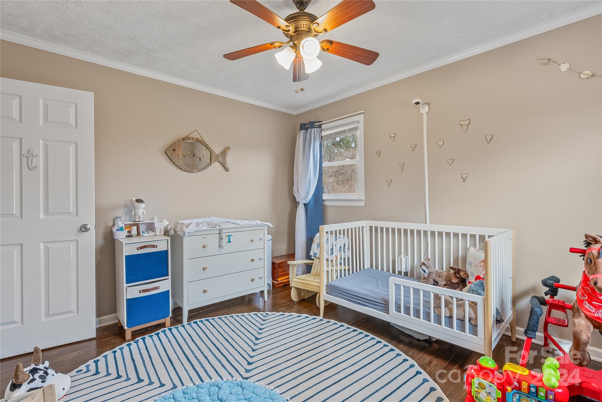 242 Maple Creek Road Rutherfordton, NC 28139 - Photo 26 of 37 a bedroom with furniture and a window