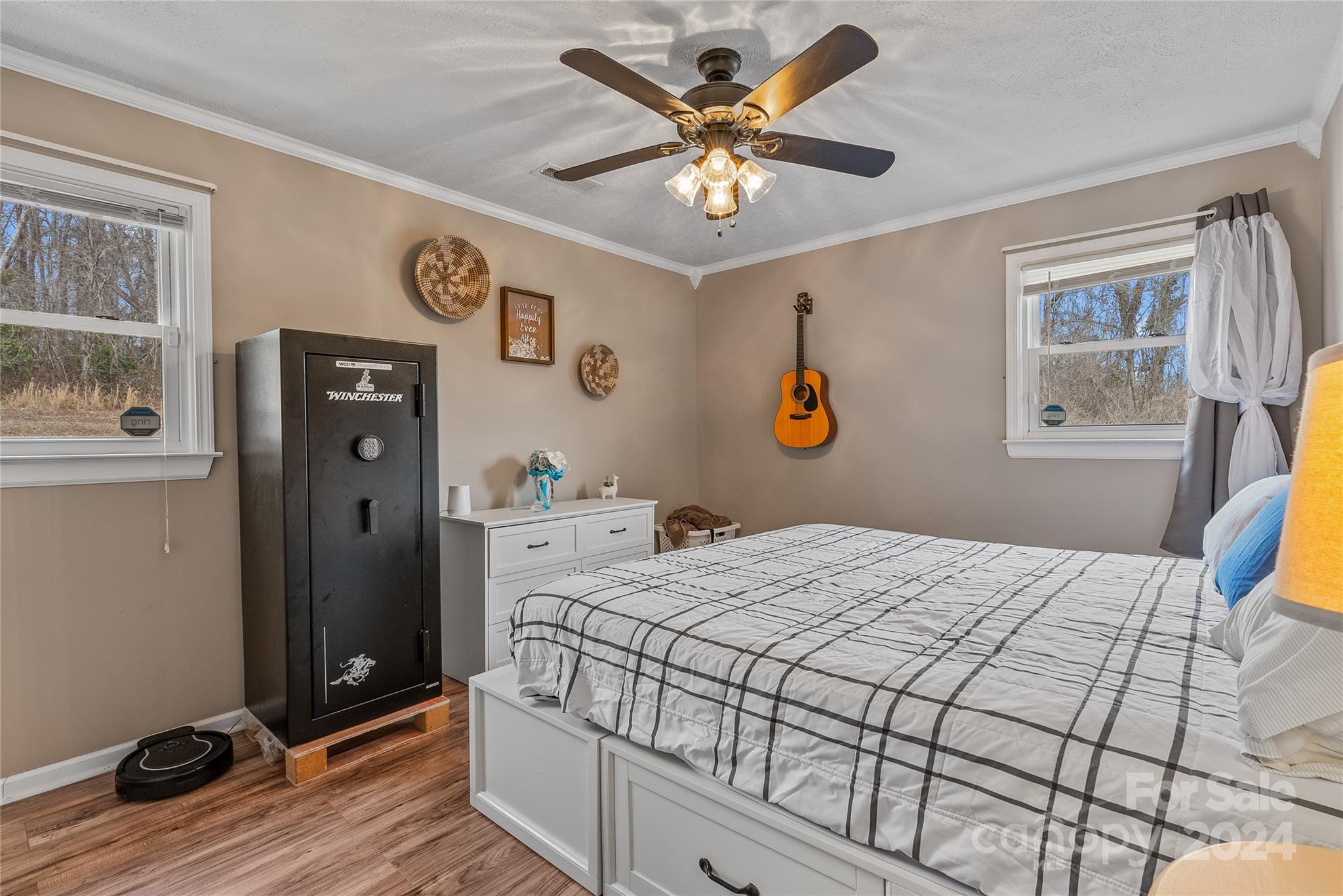 242 Maple Creek Road Rutherfordton, NC 28139 - Photo 30 of 37 a bedroom with a bed and a window