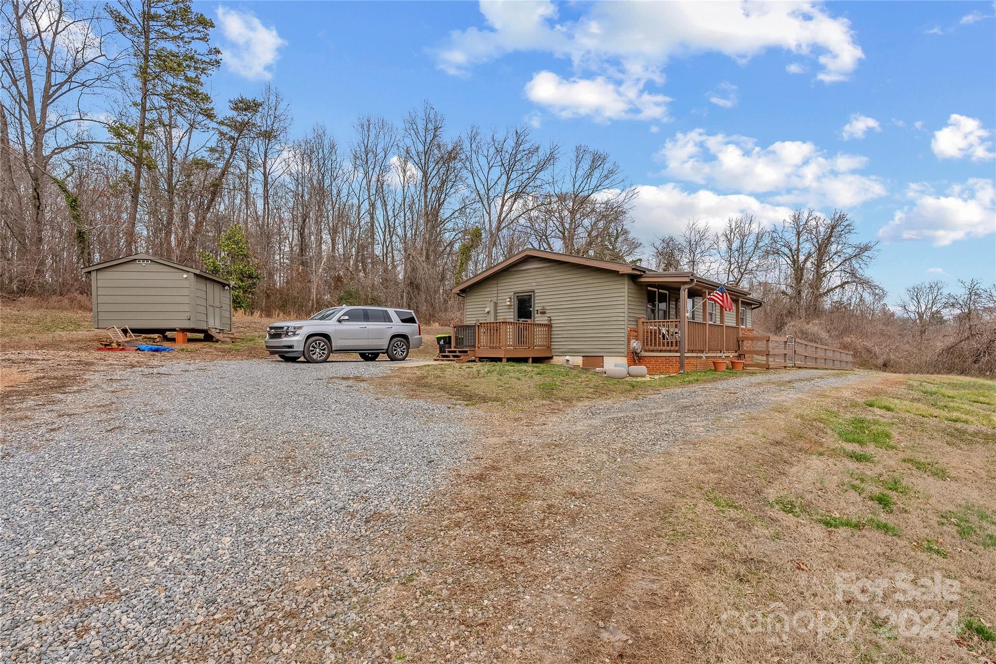 242 Maple Creek Road Rutherfordton, NC 28139 - Photo 33 of 37 a view of a house with snow on the road