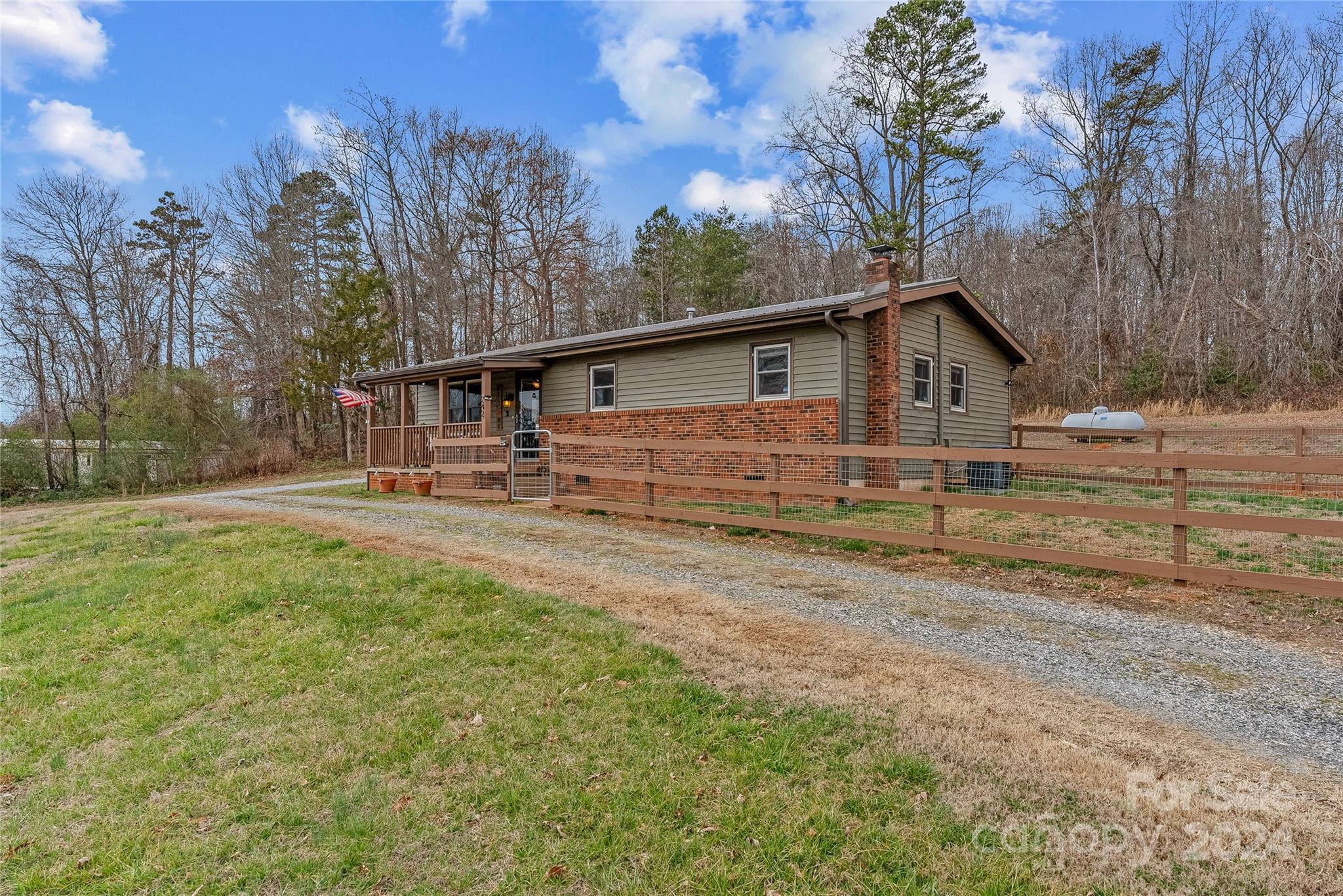242 Maple Creek Road Rutherfordton, NC 28139 - Photo 35 of 37 a view of a house with backyard and trees