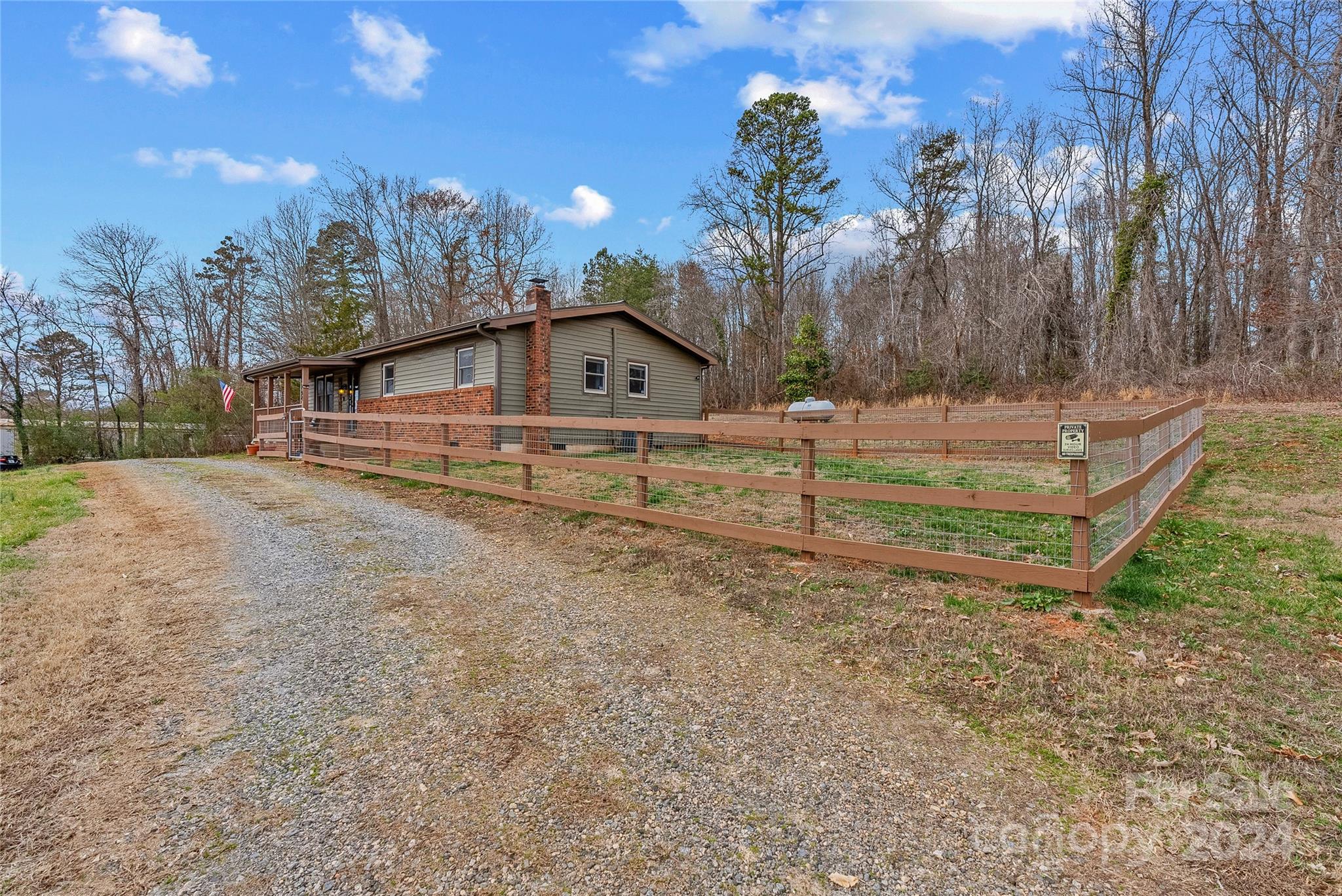 242 Maple Creek Road Rutherfordton, NC 28139 - Photo 37 of 37 a view of a house with a yard