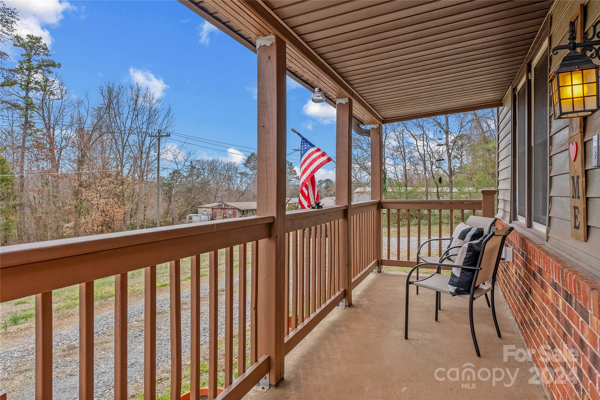 242 Maple Creek Road Rutherfordton, NC 28139 - Photo 4 of 37 a view of two chairs in the balcony