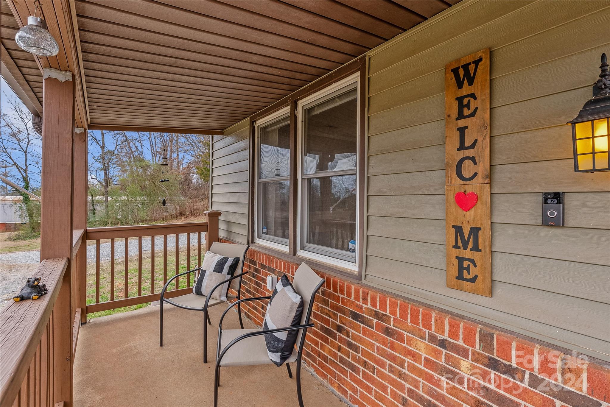 242 Maple Creek Road Rutherfordton, NC 28139 - Photo 5 of 37 a balcony view with a seating space