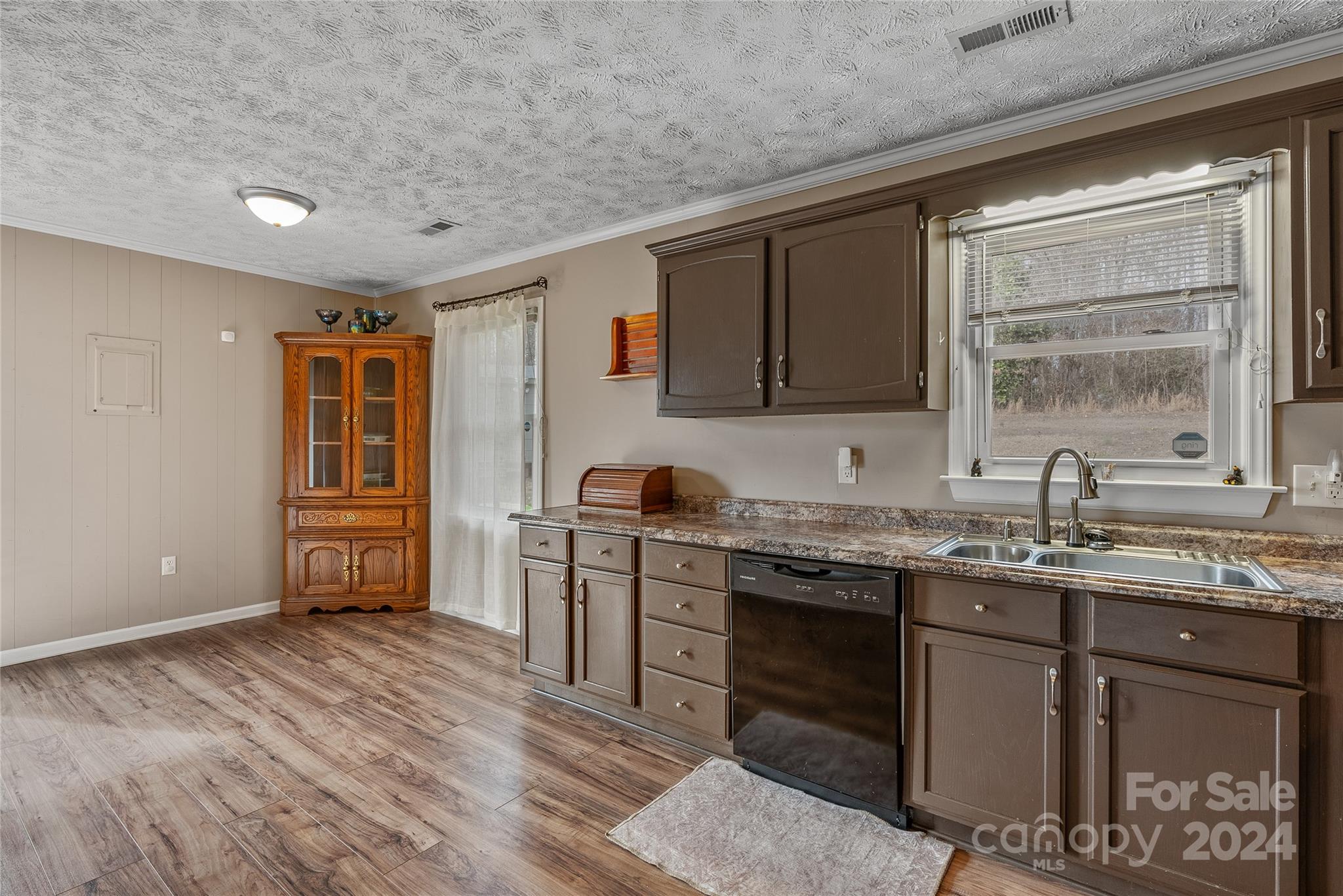 242 Maple Creek Road Rutherfordton, NC 28139 - Photo 9 of 37 a kitchen with stainless steel appliances granite countertop a sink stove and refrigerator